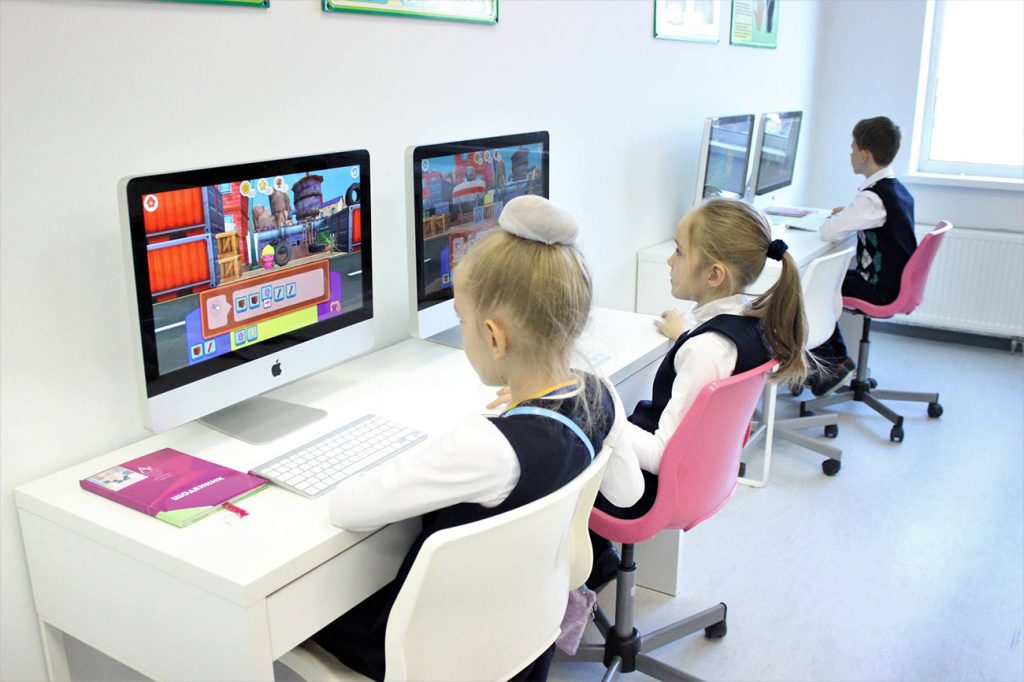 image of students using computers