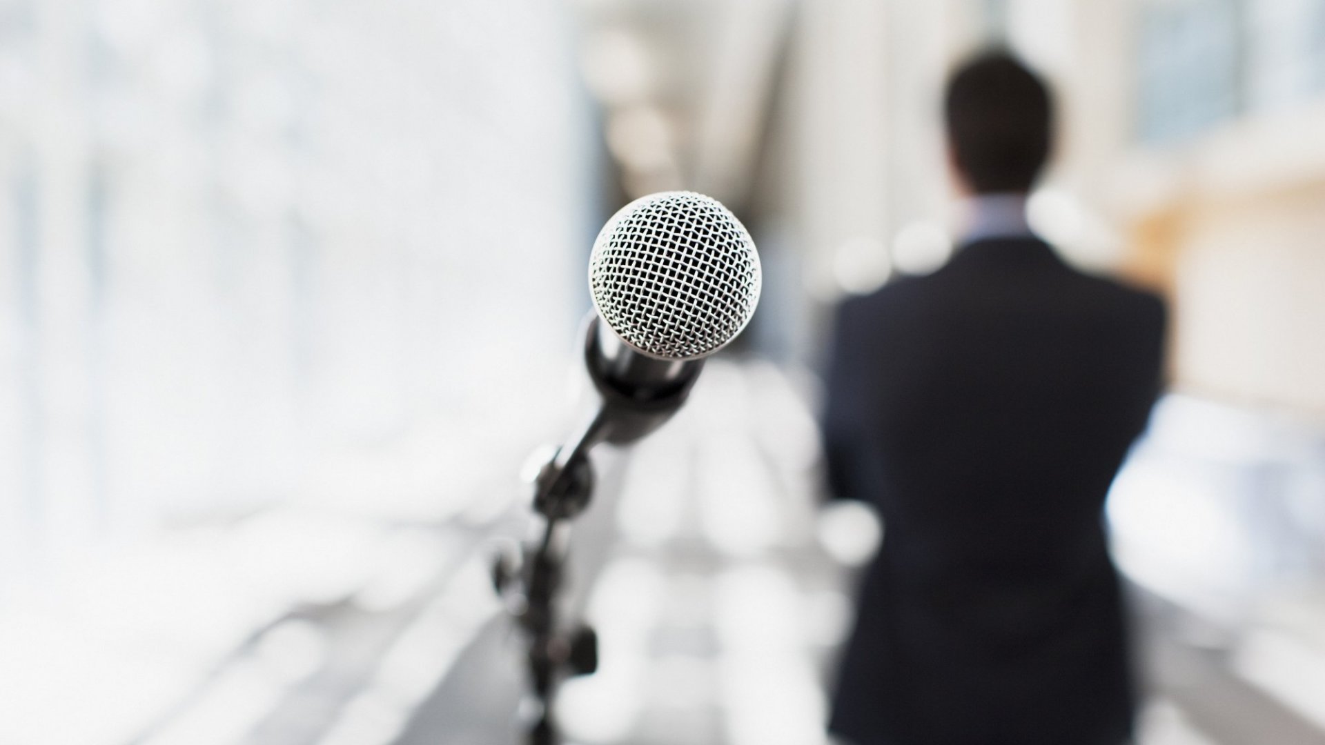 close up image of a microphone directed at the viewer
